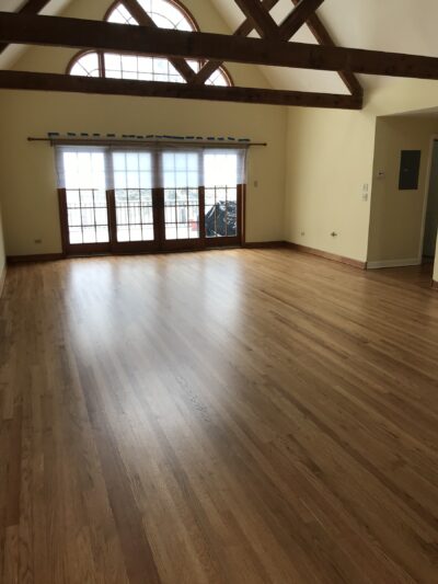 Golden Oak floor in the great room with wood ceiling beams, Western Springs, IL