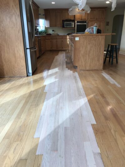 New boards laced into the existing floor to replace damaged sections, Western Springs, IL (in-process)