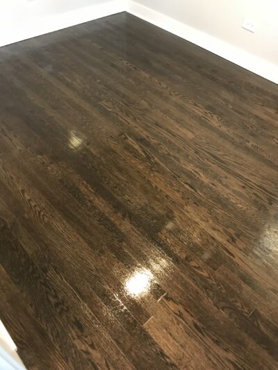 Ebony-stained hardwood floor in the room corner, Wheaton, IL