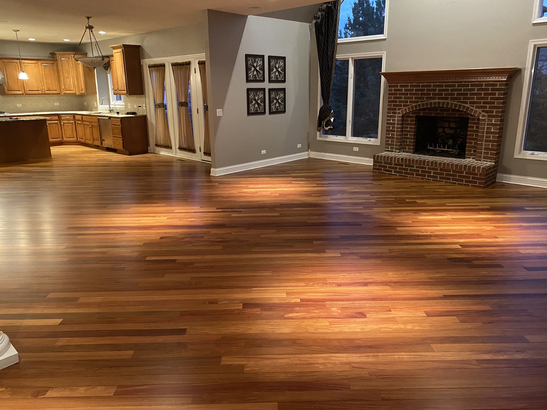 Brazilian cherry floor refinished to a rich natural red-brown in the great room, Wilmette, IL