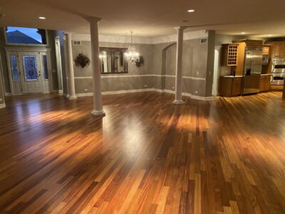 Open great room with columns and chandelier, rich Brazilian cherry floor, Wilmette, IL