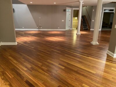 Open main level with columns and staircase beyond, Brazilian cherry floor, Wilmette, IL