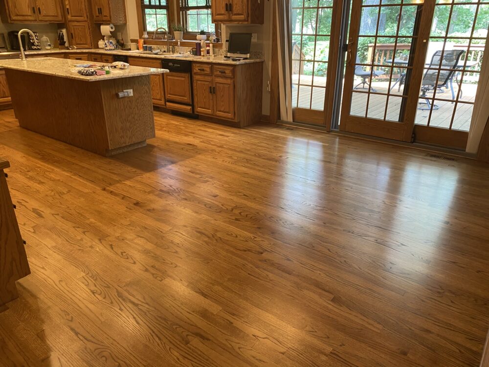 Golden Oak floor in the kitchen with island, Winnetka, IL