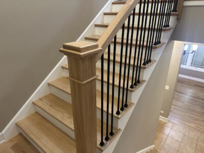 White oak staircase with black metal balusters and newel, Yorkville, IL