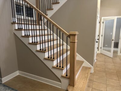 White oak staircase with white risers and black balusters, Yorkville, IL