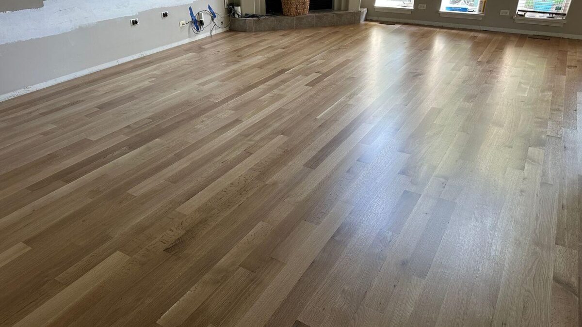 Newly installed white oak flooring after sanding and preparation for the natural finish.