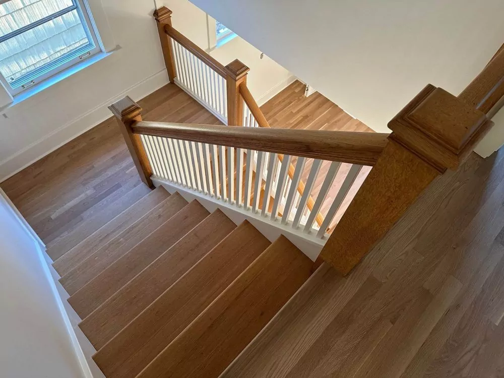 Refinished oak floors and stairs after our work
